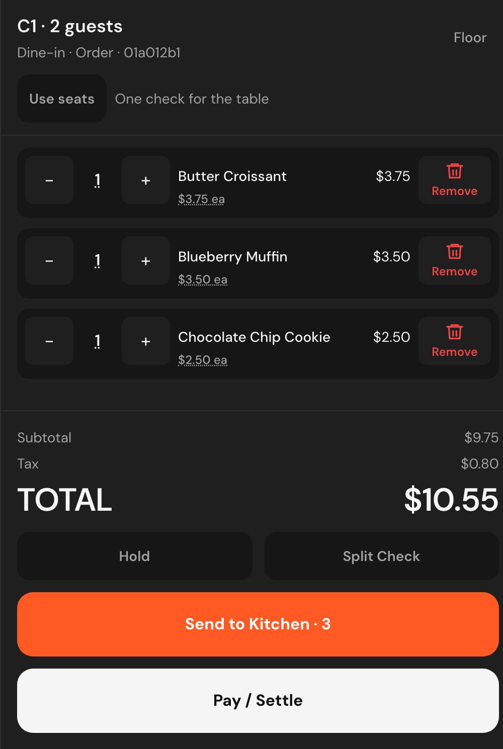 A café table’s open ticket: table C1, two guests, a butter croissant, a blueberry muffin and a cookie coming to $10.55, above buttons to hold it, split the check, send it to the kitchen or settle up.